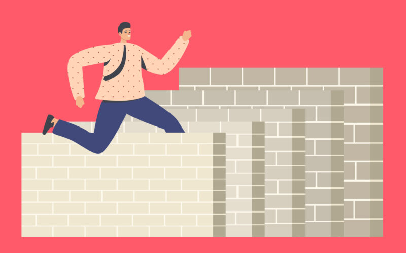 動画制作5つの壁を飛び越えようとしている広告代理店のビジネスパーソン